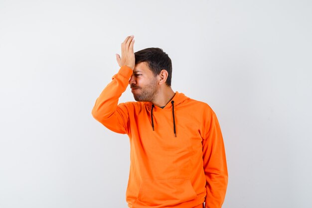 Expressive young man posing in the studio