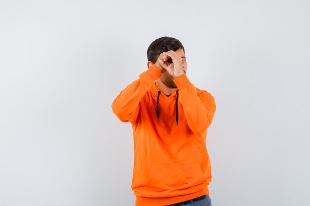 Expressive young man posing in the studio