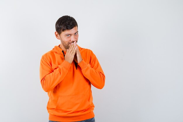 Expressive young man posing in the studio