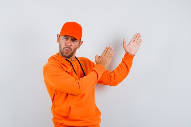 Expressive young man posing in the studio