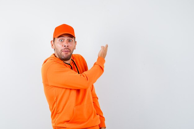 Expressive young man posing in the studio