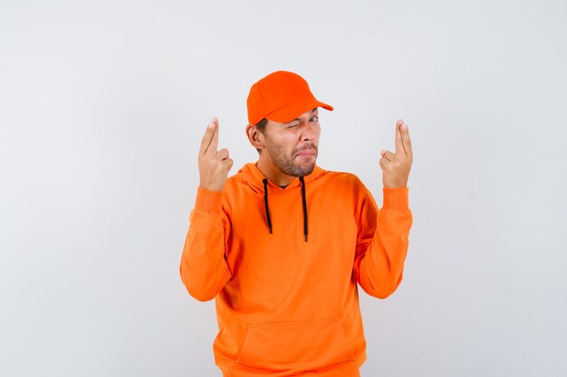 Expressive young man posing in the studio