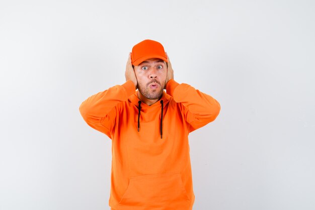 Expressive young man posing in the studio