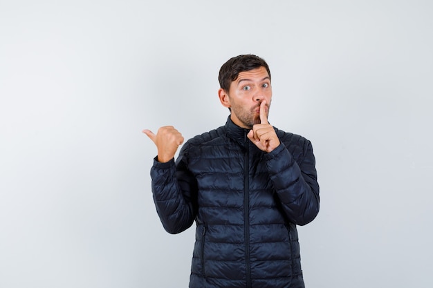 Expressive young man posing in the studio