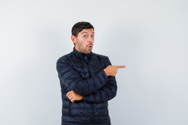 Expressive young man posing in the studio