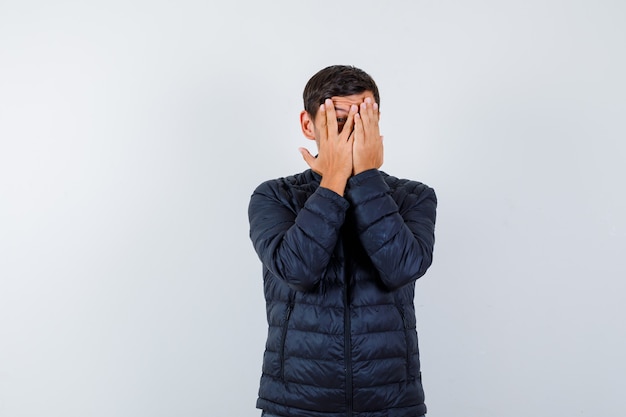 Expressive young man posing in the studio