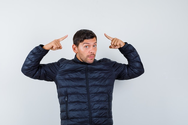 Expressive young man posing in the studio