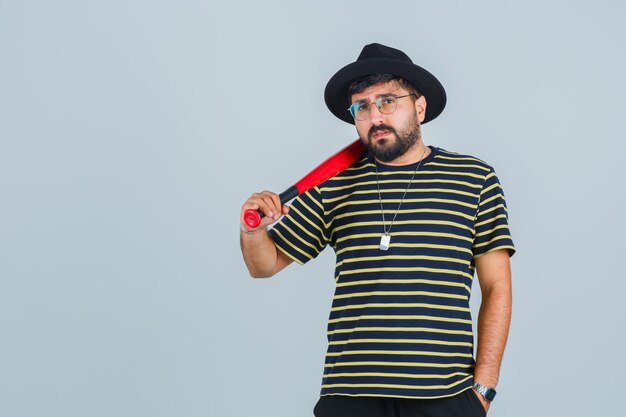 Free photo expressive young man posing in the studio