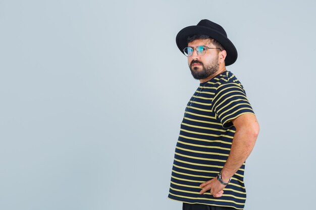 Expressive young man posing in the studio