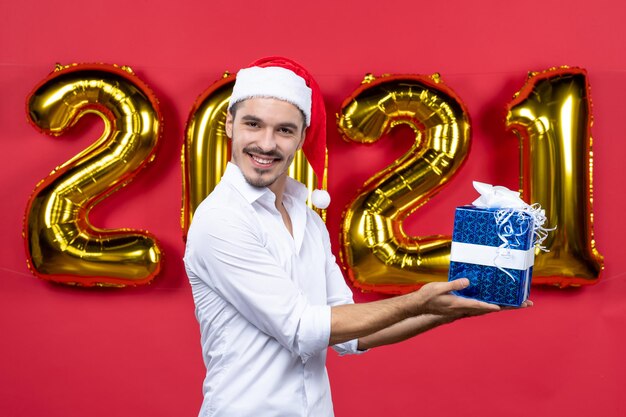 Expressive young man posing for winter holidays