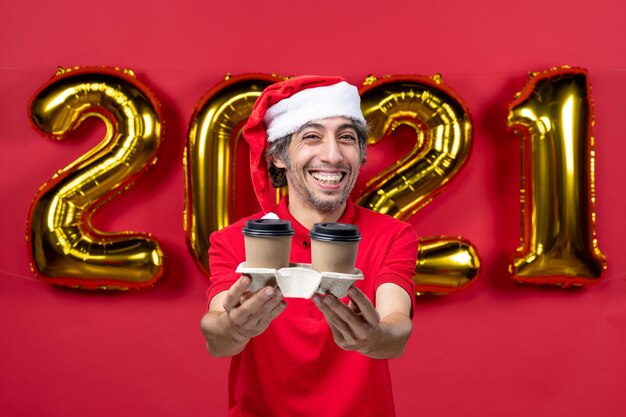 Expressive young man posing for winter holidays