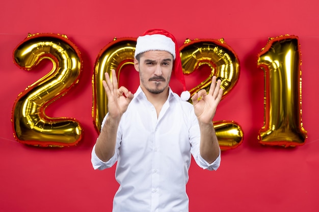 Expressive young man posing for winter holidays