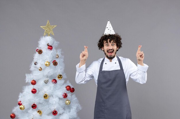 Expressive young man posing for winter holidays