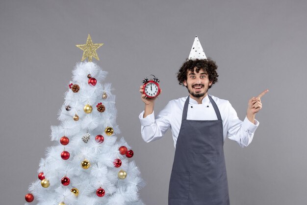 Expressive young man posing for winter holidays