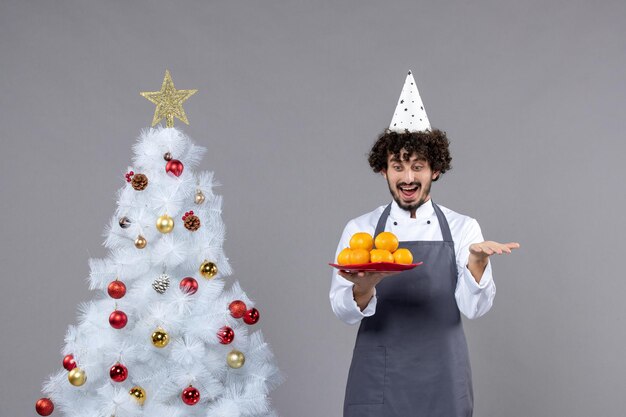 Expressive young man posing for winter holidays