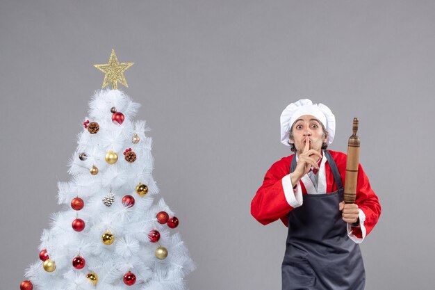 Expressive young man posing for winter holidays