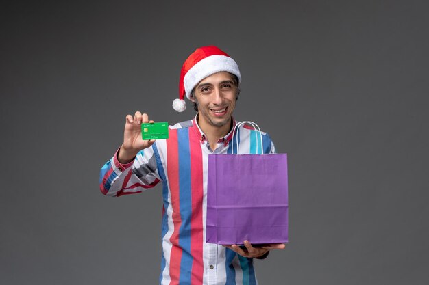 Expressive young man posing for winter holidays