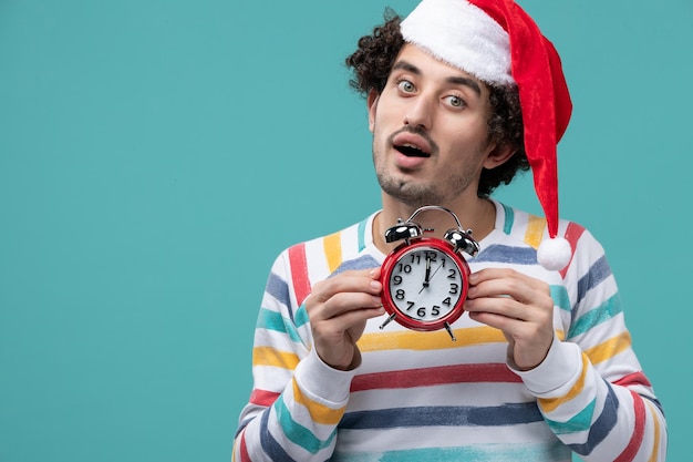 Expressive young man posing for winter holidays