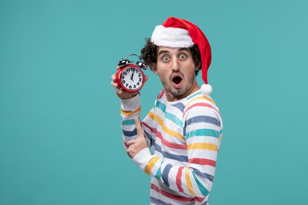 Expressive young man posing for winter holidays