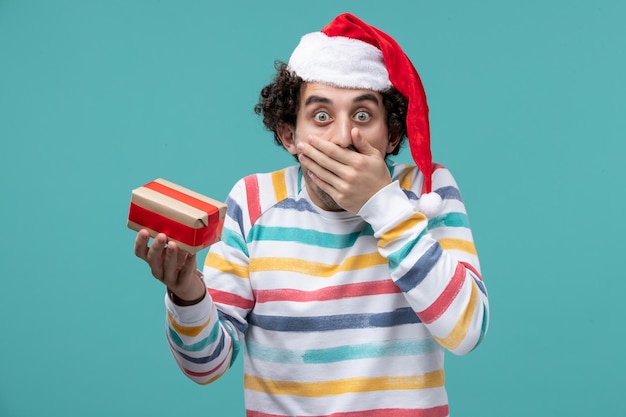 Expressive young man posing for winter holidays