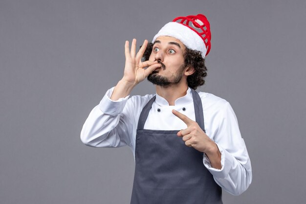 Expressive young man posing for winter holidays