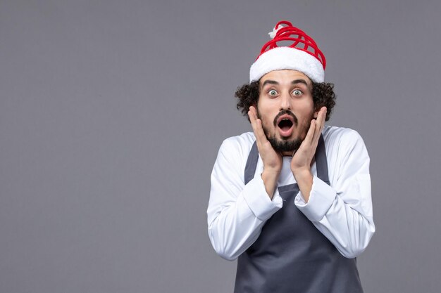 Expressive young man posing for winter holidays