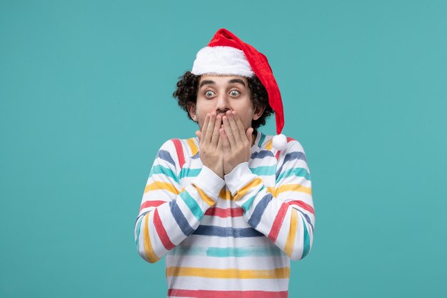 Expressive young man posing for winter holidays