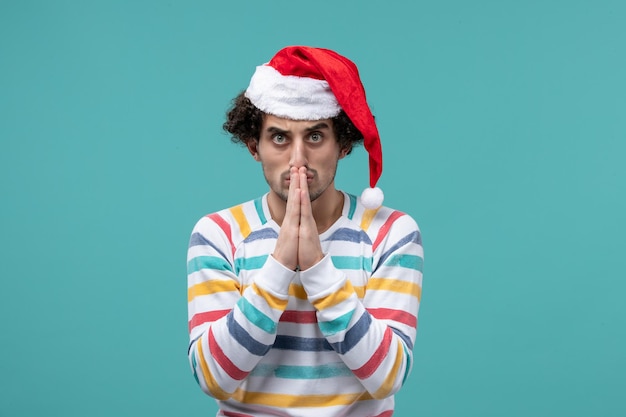 Expressive young man posing for winter holidays