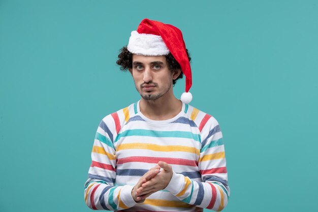 Expressive young man posing for winter holidays