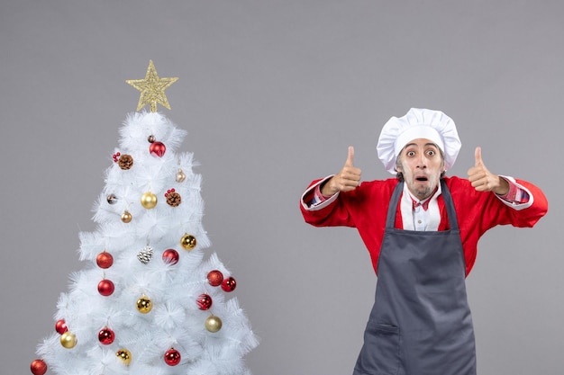 Expressive young man posing for winter holidays