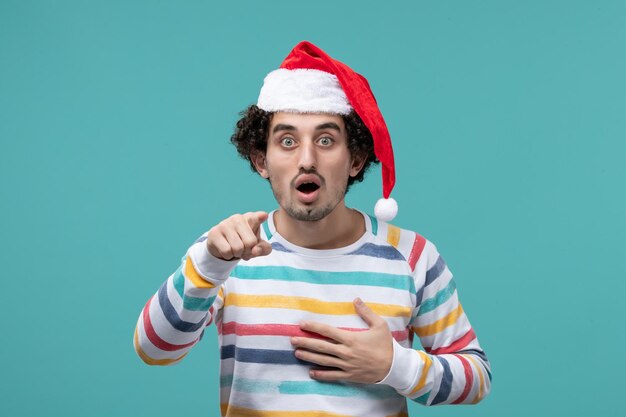 Expressive young man posing for winter holidays