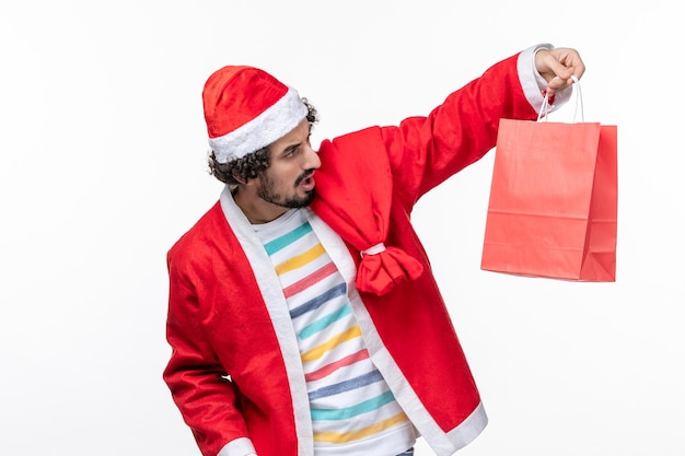 Expressive young man posing for winter holidays