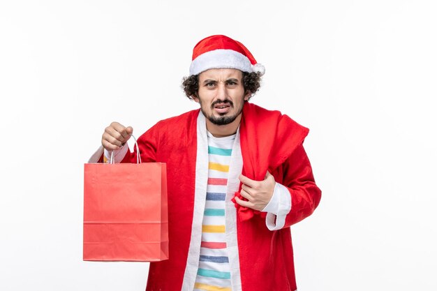 Expressive young man posing for winter holidays