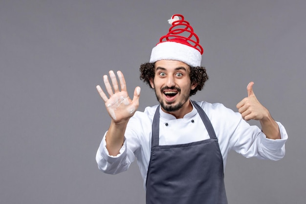 Expressive young man posing for winter holidays