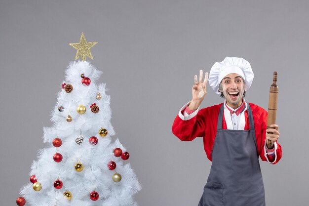 Expressive young man posing for winter holidays