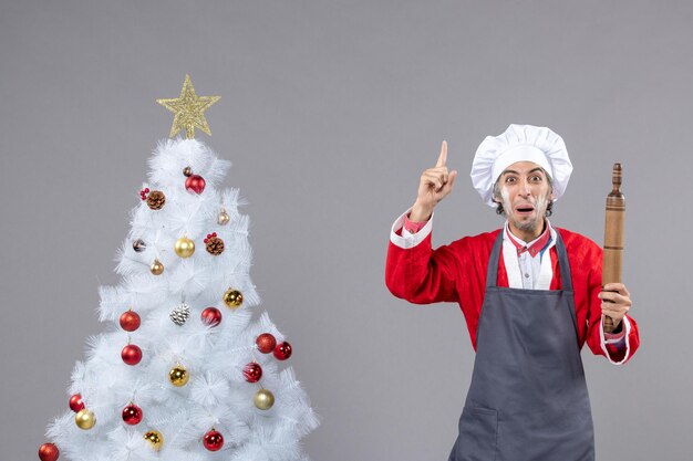 Expressive young man posing for winter holidays