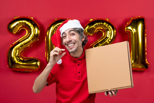 Expressive young man posing for winter holidays