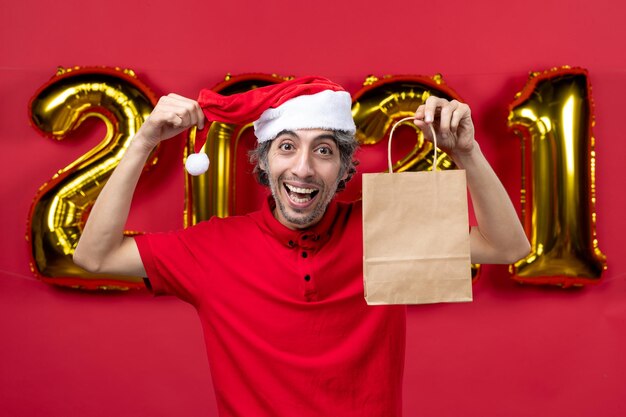 Expressive young man posing for winter holidays