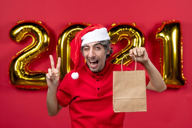 Expressive young man posing for winter holidays