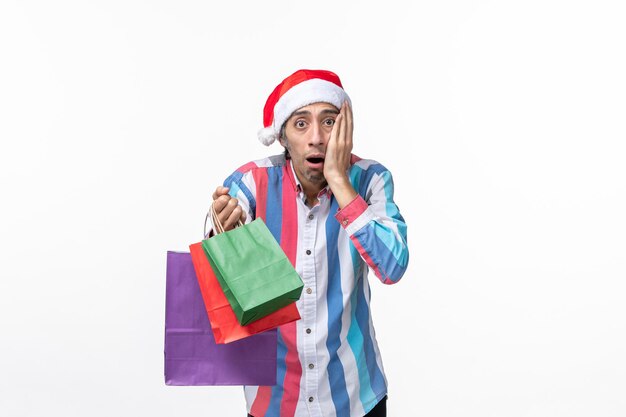 Expressive young man posing for winter holidays