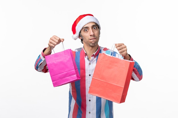 Expressive young man posing for winter holidays