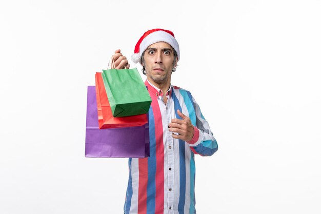 Expressive young man posing for winter holidays