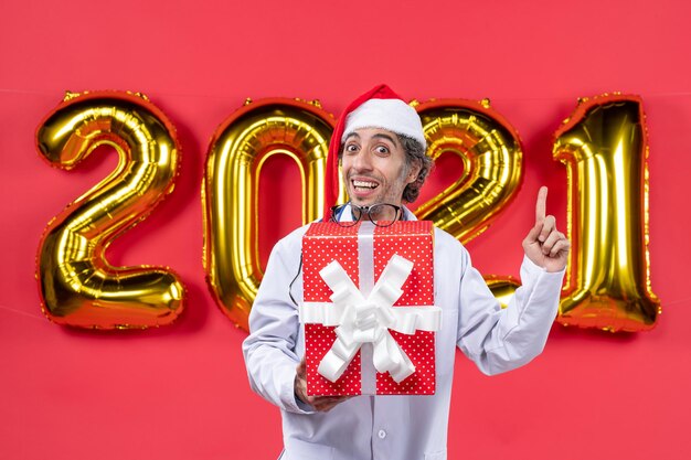 Expressive young man posing for winter holidays