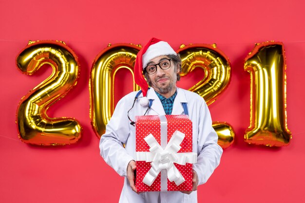 Expressive young man posing for winter holidays