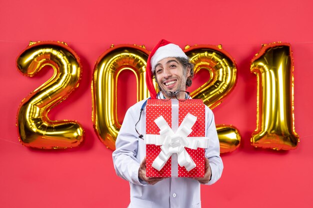 Expressive young man posing for winter holidays