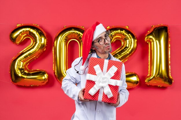 Expressive young man posing for winter holidays