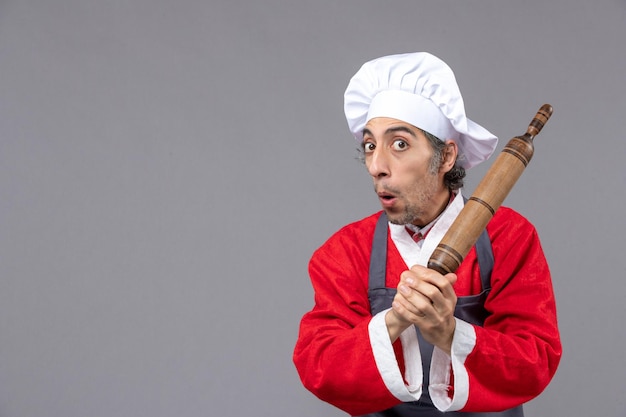 Expressive young man posing for winter holidays