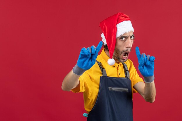 Expressive young man posing for winter holidays