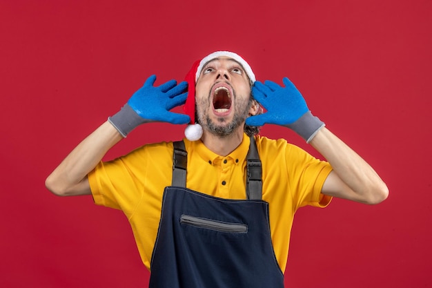 Expressive young man posing for winter holidays