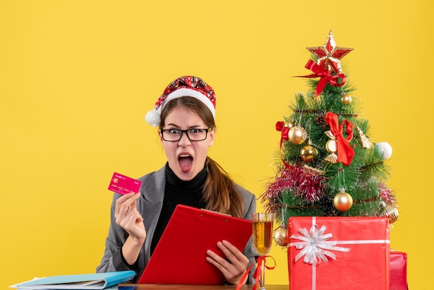 Expressive young woman posing for Christmas